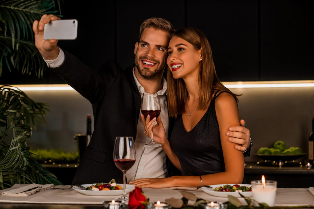 a man and woman taking a selfie