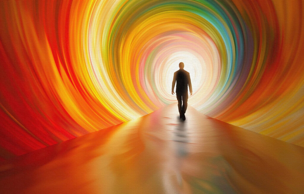 a man walking on a road with colorful swirls - how to reinvent yourself and start over