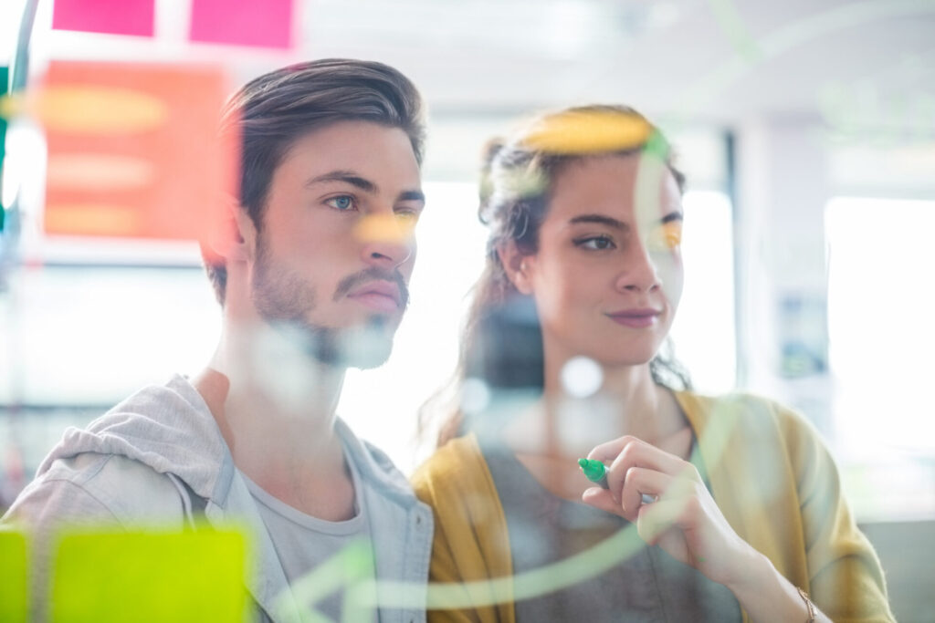 a man and a woman at the board - daily habits for success