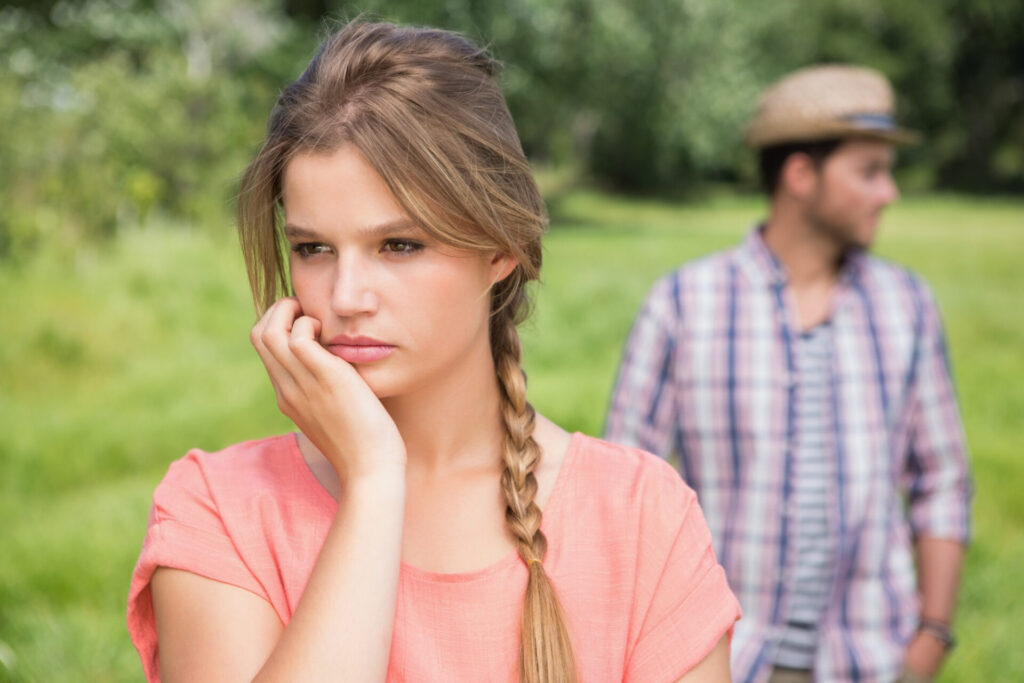 Why Do I Push Him Away?: a woman with her hand on her face
