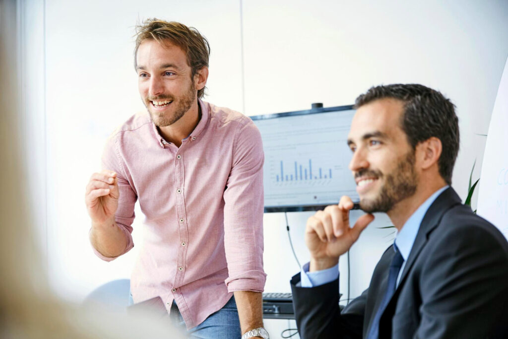 Techniques for Effective Mirroring: a man in a pink shirt smiling