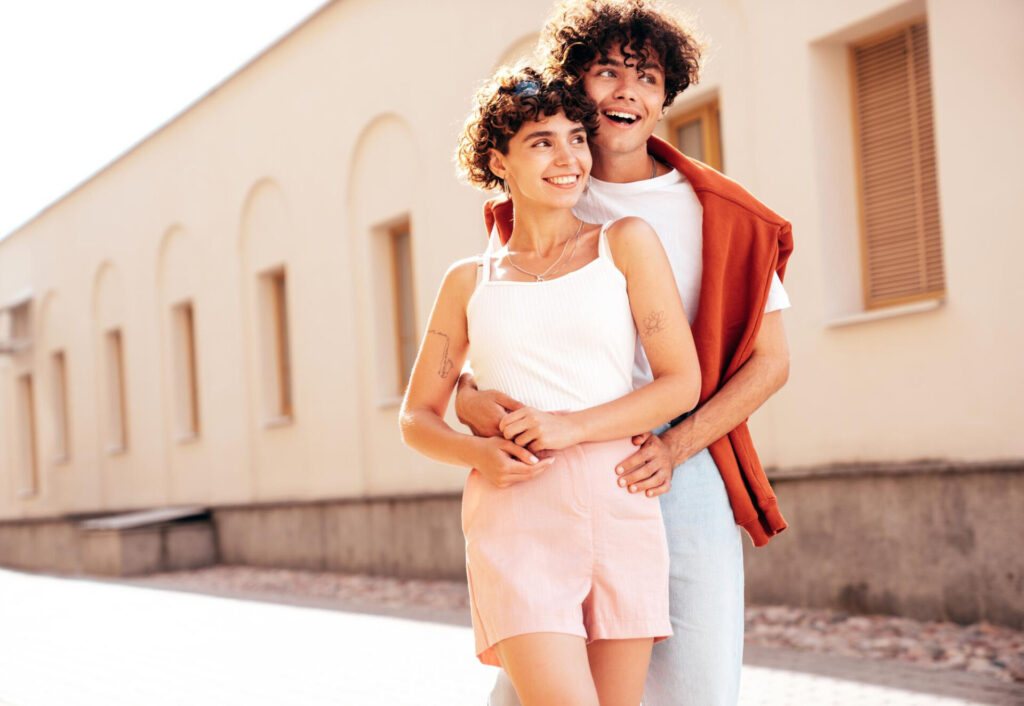 How to Make a Cross-Cultural Relationship Work: a man and woman hugging outside