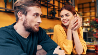 How to Build Rapport Quickly and Naturally: a man and woman sitting at a table