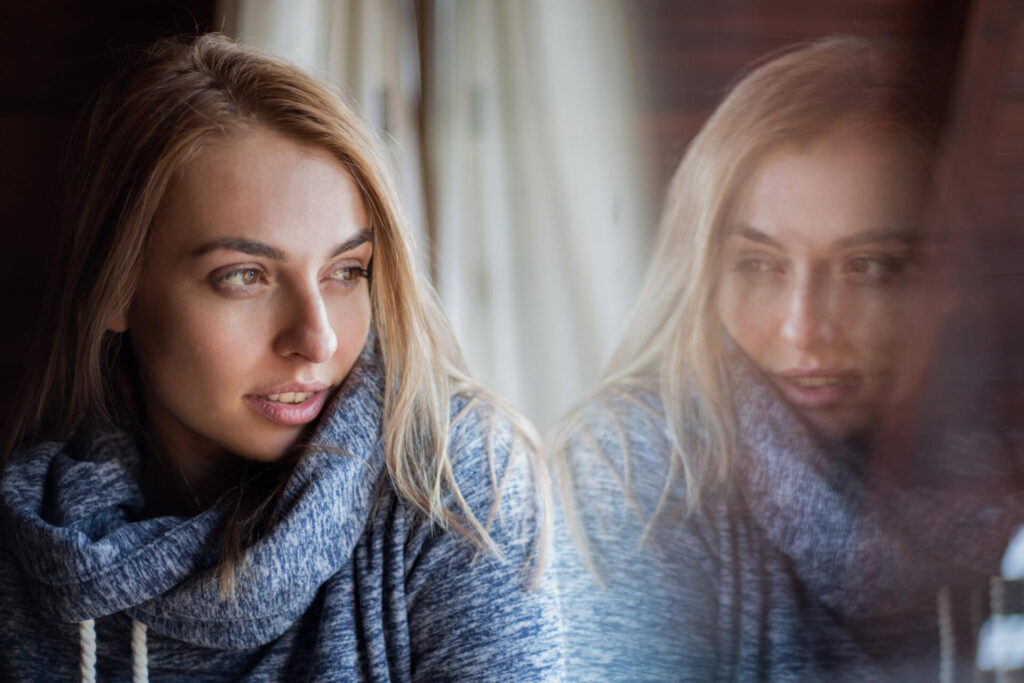 setting boundaries in relationships: a woman looking at herself