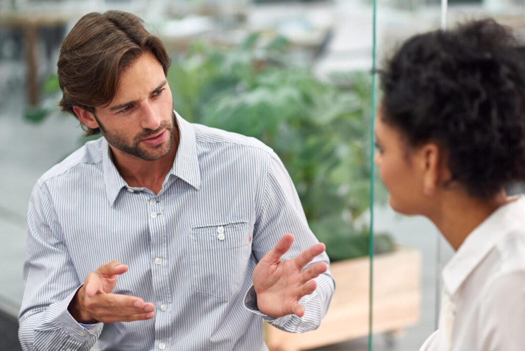 a man and woman talking