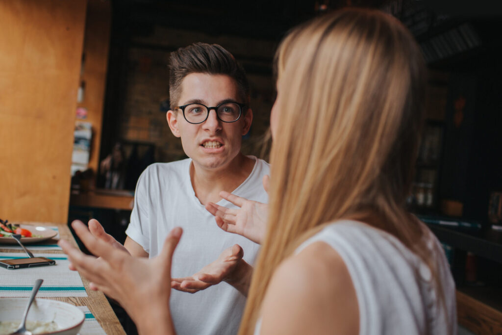 how to control anger in a relationship: a man and woman talking