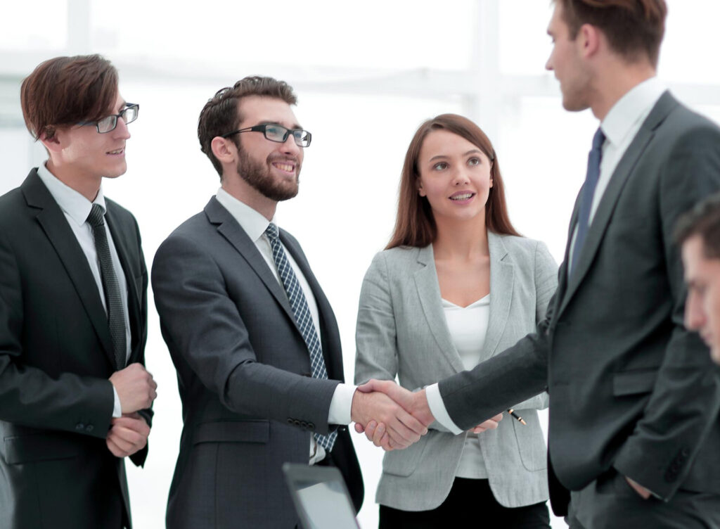 conflict resolution through mutual respect: a group of people shaking hands