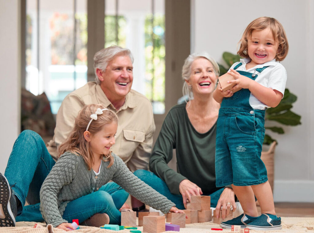 family playing with blocks - how to build strong relationships with grandchildren