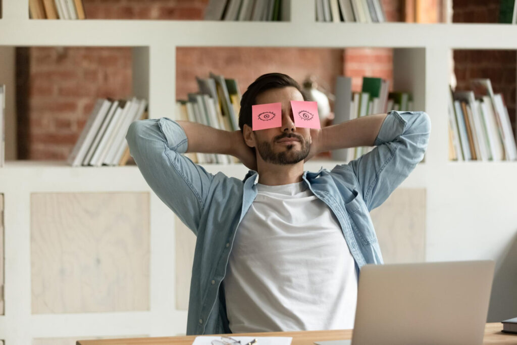 happy tired man - stay motivated when you're tired
